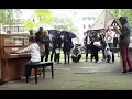 Download Lagu 11 year old George Harliono plays Moonlight Sonata (3rd mov) on a Street Piano in the rain.