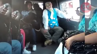 clown gets on the van and makes everyone laugh