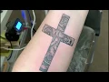 roses forming a cross tattoo