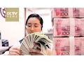 Causes and consequences of RMB depreciation