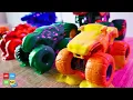 Colorful Monster Trucks Take A Dip In Paint