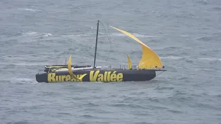 Louis Burton “Bureau Vallee” IMOCA under Jury Rig headed in after dismasting 10 hours into the race