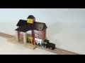 Mentari - Stationsgebouw met slagboom