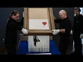 Download Lagu Banksy's Shredded Painting Sells for Record $25.4 Million