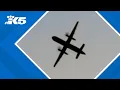 Extended Horizon employee talks with air traffic control in cockpit