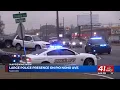 Multi-agency detail executing search warrants along Pio Nono Avenue
