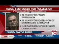 Felon sentenced for possession of firearm controlled substance