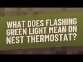 What does flashing green light mean on Nest thermostat