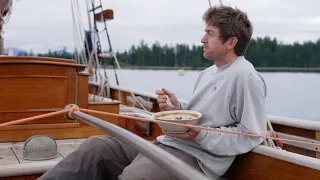A realistic day living alone on a wooden boat.