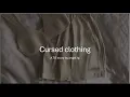 Cursed clothing a caption
