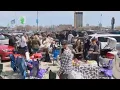 Baseball fans tailgate and smile in the sun at White Sox home opener