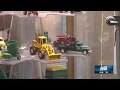Man shows off collection of toy tractors