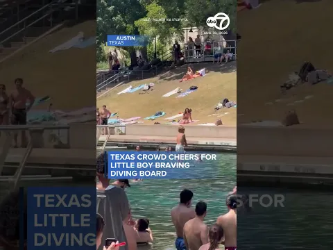 Crowd cheers for little boy braving diving board