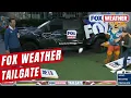 Watch Nick Kosir And Bayne Froney Play Cornhole Blindfolded At FOX Weather Tailgate