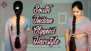 south indian clipped hairstyle with long hair