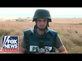 Trey Yingst forced to take cover in Israel as military shells Gaza