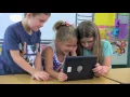 First graders programming robots Success Starts Here