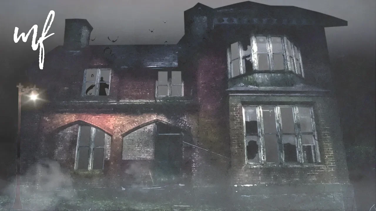 A decaying brick mansion with broken windows and a figure in an upstairs window