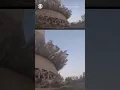 Tennessee nuclear cooling tower crashes down in controlled implosion