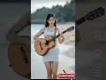 Download Lagu viral cewek cantik dan anggun main gitar akustik di pantai rusia#shorts #music #viral