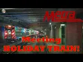 Inbound Metra Electric to Millennium w Holiday Train