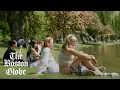 Boston locals make their way outside to sunbathe relax and enjoy the weather