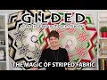 Gilded Christmas Tree Skirt Pattern  is a modern, graphic tree skirt shown in black and white, or on the flip side of the pattern, in red and green. - Video 3 of 1