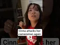 Cinna attacks her cameraman again