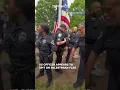 Download Lagu US police officer appears to be spitting on Palestinian flag