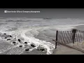 Waves crash at oceanfront at Stone Harbor