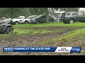 Rain turns Iowa State Fair parking lots into muddy obstacles