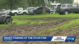 Rain turns Iowa State Fair parking lots into muddy obstacles