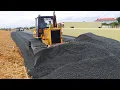 Bulldozer Spreading Gravel Building Foundation New Big Road And Dump Truck Unloading Gravel ...