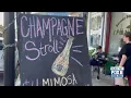 Bottles popped for the annual Mother s Day weekend Champagne Stroll