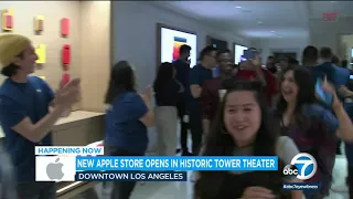Apple CEO Tim Cook greets customers at new store in downtown LA s converted Tower Theater ABC7