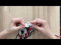Purl 2 together through back loops p2tog-b