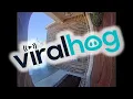 FedEx Delivery Guy Slides Across Ice Delivering Package in Style ViralHog