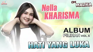 Download Nella Kharisma \u0026 Sumo Suling Gendeng - Hati Yang Luka (Official Music Video) | Patrol Jandhut MP3