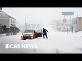 Lagu Videos show the winter storm descending on parts of the U.S.