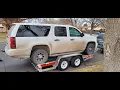 Does a suburban fit on a U-Haul trailer Yep