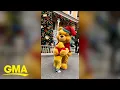 Download Lagu Adorable toddler meets Winnie the Pooh while dressed as the beloved character