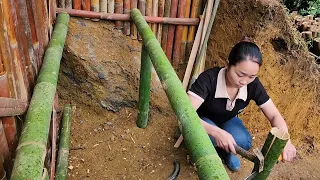 Survival experts built an underground shelter with a warm campfire. cooking and bushcraft