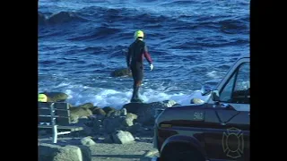 Archival Footage Investigators gather wreckage from John Denver s plane crash 1997