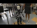 A Benchmarking of DCM Based Architectures for Walking Humanoid Robots