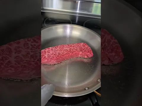 Steak and egg on 1 steel pan