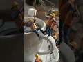 Tiny Construction Workers Fixing a Giant Coffee Cup