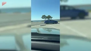 Car Gets Stuck Over Parking Block - 1856538