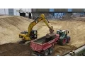 Download Lagu Soeren66 - Bagger CATERPILLAR 319D belädt Trecker mit Dumper, Vogelperspektive