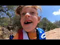 Shepherd cliff jumping into the Devil s Waterhole at Inks Lake