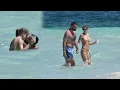 Taylor Swift and Travis Kelce caught kissing in swimwear during Bahamas vacation